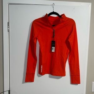 GREYSON! Bright orange. Size M